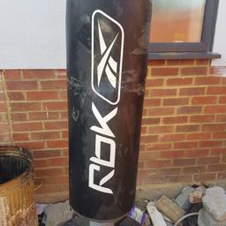 standing punch hardely used it's been in garage so looks dirty it had tape wrapped around it so looks dirty but it's in good condition good for light sparring its not heavy and hard