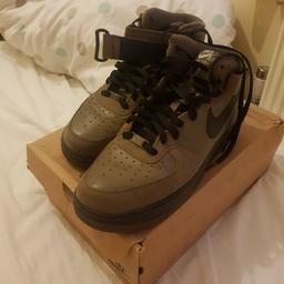 selling my air force ones. they are a rare and unique color and purchased many years ago. they are dark brown/greyish in color. and have a suede like feel. in very good condition. not used a lot. size 10. dont have original box. this is another box. no offers.
