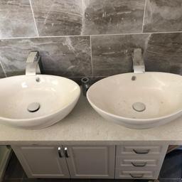2 x Durovin wash basin bowl ceramic counter Top oval shape (580mm) with pop up waste × 2 and 2 waterfall taps. These were bought for my new bathroom but I have decided to change the whole design. All items are new and unused, just out of packaging. Feel free to ask questions. This listing does not include the under basin unit. Pick up is Chatham kent. Thanks.