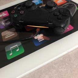PS4 wireless controller, in black, good condition, works perfectly.