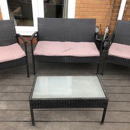 Rattan furniture and table . grey seat pads discoloured / marked In places however still useable ! Rattan sofa few marks see pictures