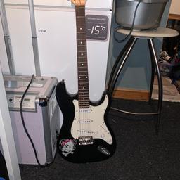 Electric Guitar with sticker on. Not been used in years but in good shape. Collection only. Good for children who are learning.