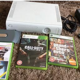 Xbox 360 with 3 games and wires used condition but works fine