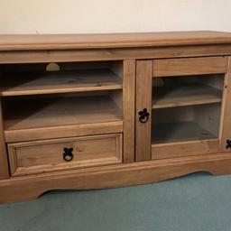 Pine wood TV cabinet.
Used but as new. I just had a TV on top, so minor marks from TV legs.
Shelves, drawer and cabinet door all work. No scratches to glass.
106 wide x 46 deep x 59 high