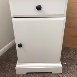 White solid bedside table