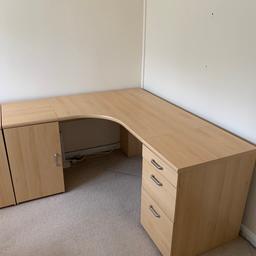 A solid desk, in 3 parts - Corner piece, 3 drawer set and single door cupboard.
All parts present, may have manual

Single door cupboard has one shelf
3 Drawer unit - 1st draw is a pen draw and 2 others are general draws - 3rd one can be used for suspension files (rails included)

The 2 side units are fully assembled but corner piece has been dismantled for easier collection.
Easy to put together

In good condition - Drawer has some marks but functional

All sizes included in photo - Any Qs ask