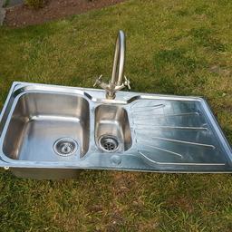 FOR SALE STAINLESS STEEL SINK WITH WAIST COMPARMENT PLUS TAP WITH FIXING CLIPS ITS IN FANTASTIC CONDITION SIZES ARE 100CM BY 50 CM ANY QUESTIONS PLEACE FEEL FREE TO CONTACT 07737711417 BARGAIN ONLY £12