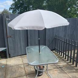 Silver table
Light grey parasol