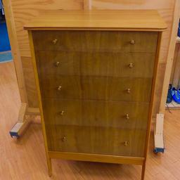 Vintage light wood chest of drawers. Good condition. Structurally solid and sound.

Dimensions are height 1200mm, width 790mm and depth 480mm

Delivery available for small fee.