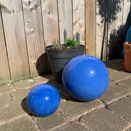 One massive ball with matching smaller ball.frost free UV protected.made of heavy earthenware.in good clean condition no chips or cracks Bargain £30.00 no offers
