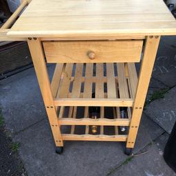 Kitchen trolley with space for wine 
Has a drawer aswell for storage of utensils 
It does have a child catch on the drawer as I have children but can be easily un screwed with no damage 
There is a few scratch marks on the bottle ledge but that’s due to the bottles being pushed on 
Buyer to collect please 
Price is to reflect the scratch marks 
Thanks check out my other items