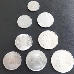 8 collectible coins from India, from 10 paise to 2 rupees.

No exchanges and no refund.