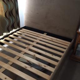 Double bed base e attached head board ,in a brow-taupe colour almost brand new no not a mark on it ,cost a lot when bought just swapping for a single .collection only