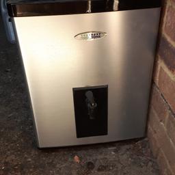 Mini Fridge with water bottle attached inside with a outside tap.
Collection Cranbrook