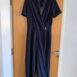 New with tag.Black label navy shirt sleeve jumpsuit in size 12 but would fit 10 too!
