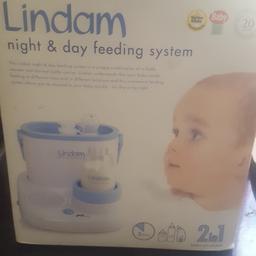 new still in box..lindam baby bottle warmer..never used as already had one..box a bit tatty from storage