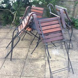 Cast iron and hard wood folding chairs TLC required odd folding metal table in good condition