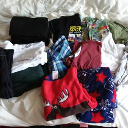 All used but good condition 
uniform trousers x4 size 7 to 8
school shirt aged x3 size 9 to 10
green school jumpers x2 size 9 to 10
boys pj s size 8 to 9 
blue striped next shit size 6 yrs 
x1 long sleeve t shirt size 5 to 6
pudsey bear bok t shirt size 7 to 8
next tropical shirt size 7 yrs
x3 plain t shirts (size 8 to 9,x1 and 9 to 10, x2)
x1 green t shirt size 10 to 11
slazengat joggers size 7 to 8
collection or can deliver if local