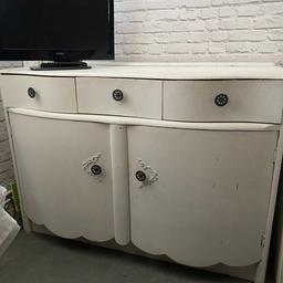 Vintage mahogany sideboard has been painted in chalk paint does need some TLC solid wood 3 draws 2 big opening doors big for storage!! 
Selling due to renovating not needed 
£70