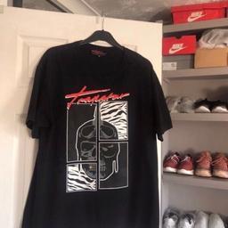trapstar size XL RARE t-shirt, has been worn has a small mark on the front (see pics) also has Velcro patch missing from the back. Can arrange collection but payment must be made through PayPal, postal order or bank transfer, once payment has been made I will leave the t-shirt in a safe place in my porch for you to collect. Can also post, postage is £3.50 and Will be sent by My Hermes tracked.