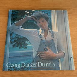 Artist: George Danzer
Title: Du Mi A
Format: LP (Album, Gatefold)

Zustand/Condition:
Vinyl: Very Good Plus (VG+)
Cover: Very Good Plus (VG+)

Label: Polydor / 2371 697
Jahr/Year Of Release: 1976
Land/Country: Österreich/Austria