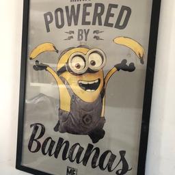 Large powered by bananas Minion picture idea for children’s bedroom. Poster is framed in a black frame