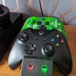 Xbox controllers green on the x button doesn't work and the black one not turning on easy fix if you know what your doing. comes with two battery packs with charger