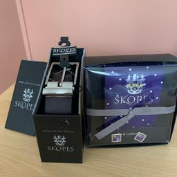 Brand new Skopes belt and purple tie and cufflink set

Comes in gift boxes and would make a great Father’s Day gift.

Adjustable belt 32”-42” 
Colour dark brown 

Tie & Cufflinks set
Tie is purple colour with white dots - very modern, comlplimented with contemporary square cuff links 

Two Great Father’s Day gifts!

£10 Ono