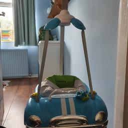 This is a baby door bouncer in the shape of a car. Very cute design, fully working. The battery cover is missing but it has maskingtape to keep batteries in place and does not effect use at all. Thanks for looking.