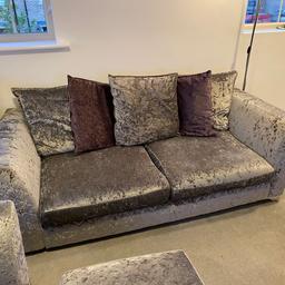 Originally purchased new in February 2018
Purchase price £1375.00. 

Pillowback 3 Seater Crushed Velvet Sofa with Amethyst/Silver cushions 
Arm Chair with amethyst cushion 
Foot Stool with storage 

There’s no rips/tears and I’ll be even not check down the sides, might be a few quid down there! 

The legs are chrome. 
Happy for potential buyer to view before purchasing. 

We’re moving at the end of July so the buyer wouldn’t be able to collect until then but happy to secure with a small deposit