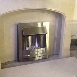 For sale Marble fire surround including hearth and Electric fire. Removed and ready for collection.
