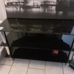 3 tier black glass tv unit fits up to 50inch 
good condition just need a dust. free to whoever wants it