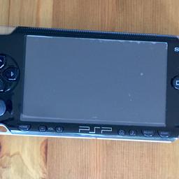 Sony PSP handheld console in black with headphones x7 games, x3 films and a 1GB memory card. The games console has hardly been used and still has the protective film on the front screen but the casing on the back does have some light scratches to the surface (as shown in the attached images).

From a smoke free home. 
Social distancing rules apply.