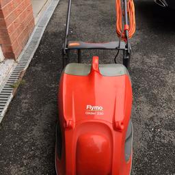 Flymo easy glide 330 excellent condition hardly used. Folds up so easy, compact and light.