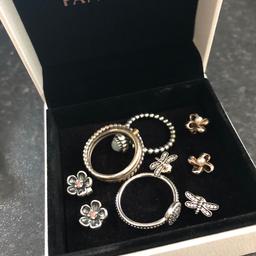 X3 stacker rings 

X3 sets of earring a never worn 

In box