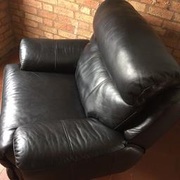 This black leather recliner is very comfy and in good condition