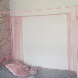 Pink four posted bed 
No mattress