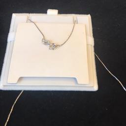 This fine chain necklace makes a beautiful backdrop for delicate pendants. 
It has been fixed/soldered back together after breakage: see pics, (3rd picture left side) though almost indivisible