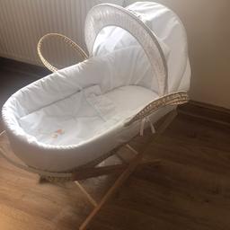 Moses basket with stand good condition comes with an extra mattress sheet
