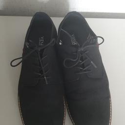 in excellent condition

size 12 UK