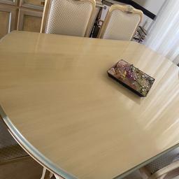 I am selling a italian style display cabinet with internal lighting, with the matching dining table and 6 chairs, a few stains on one of the chair seat (see picture). Great condition and comes from a non-smoking and pet free home. Buyer to collect.
