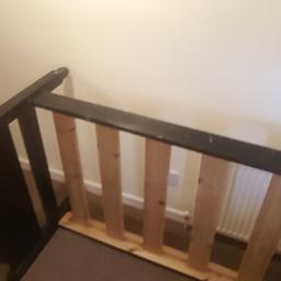 it's a wooden bed frame with head bourd comes with matteress few marks on bed frame wear an tear no need for it now