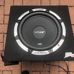 VIBE Slick SLR12A Subwoofer 1200W Amplified Active With Built In Amplifier. Very heavvvvvvvvvy bass ! Very good condition- just removed from my VW Golf. Cost new is £160. See specs below:

Height: 14.4" (367mm) Approx.
Width: 16.1" (410mm) Approx.
Depth: 16.9" (430mm) Approx.
Subwoofer Driver: Slick 12".
Impedance: 4 Ohms.
RMS Power: 400w.
Peak Power: 1200w.
Turbo Ports: 1.
Characteristics: Deep Smooth Bass.
Active Amp built in: PowerBox Bass 1.
Wiring Kit: Required, Not Included.