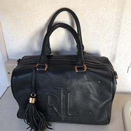 Ralph Lauren bag in good used condition little bit of wear to handles as you can see on photos and little bit of wear on the inside of the bag but over all no other marks on the outside on the leather nice size soft leather
