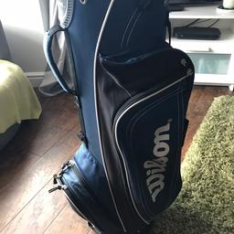 Wilson golf bag. In a used condition - all zips etc intact - can still do the job for a new starter