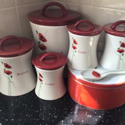 In immaculate condition and looks as good as new, kitchen set consisting of tea,coffee, sugar canisters, bread, storage tin, and biscuit barrel, these are all in porcelain china and made in poppy design