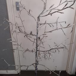 a lovely tree floor lamp in silver

tou can move arms to your desired shape all in working order as seen in pics