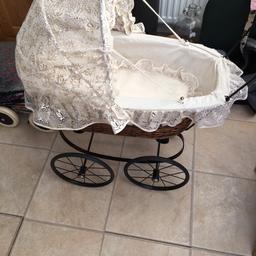Wicker design base on black metal chassis. Handle bars metL and wooden.
Lace covers included.
Yes she
Collection only.