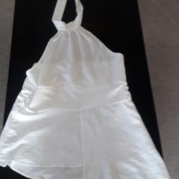 I'm selling a halter neck top by PrettyLittleThing size 18 in ivory. Only worn once. A very nice clean item.