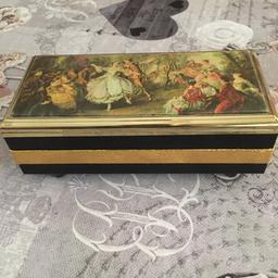 A musical jewellery box, is a wind up key used but in very good condition.